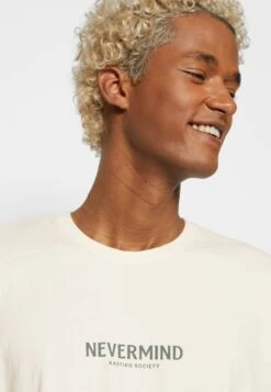 Kaotiko Nevermind Unisex - Print T-Shirt - Ivory -Kaotiko Fashion Shop d11556d7b2c246ec9b500e64d592ebbf